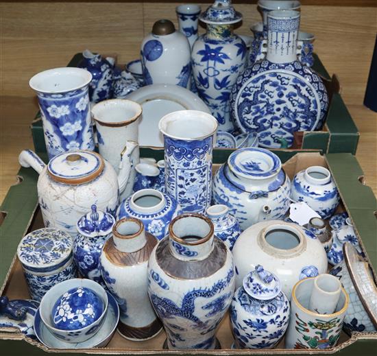 A large collection of 19th century Chinese blue and white vases, bowls, etc. and two famille rose pots